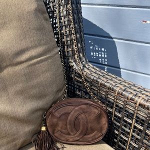 Vintage oval Chanel brown suede mini cross over bag